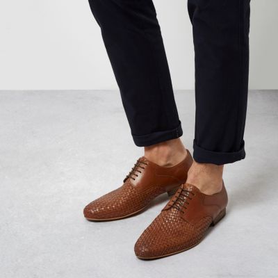 Tan woven lace-up shoes